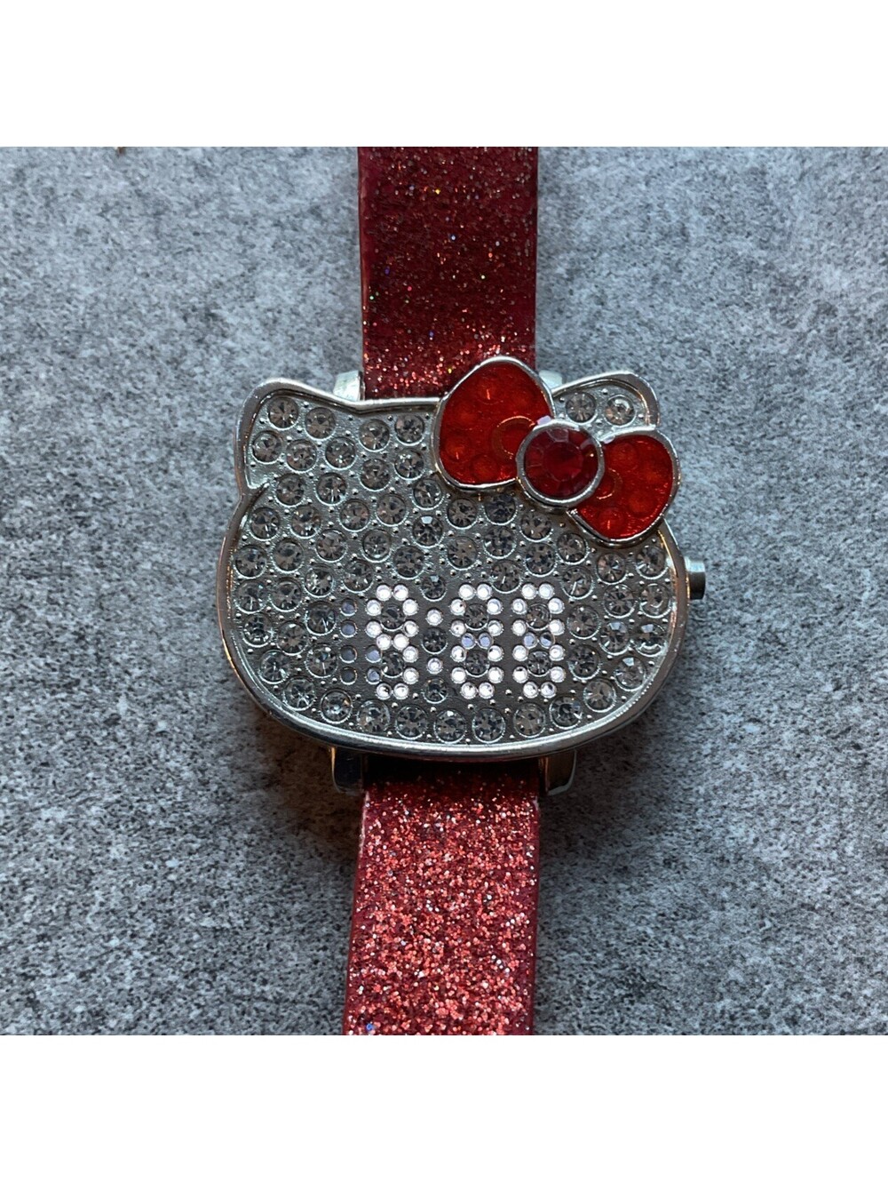 Hello Kitty Women’s Digital Watch 38mm Silver Tone Case With Red Band A10